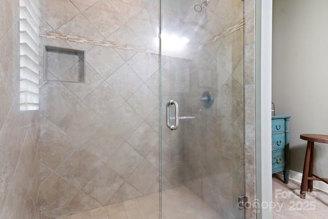 full bath featuring a shower stall and vanity
