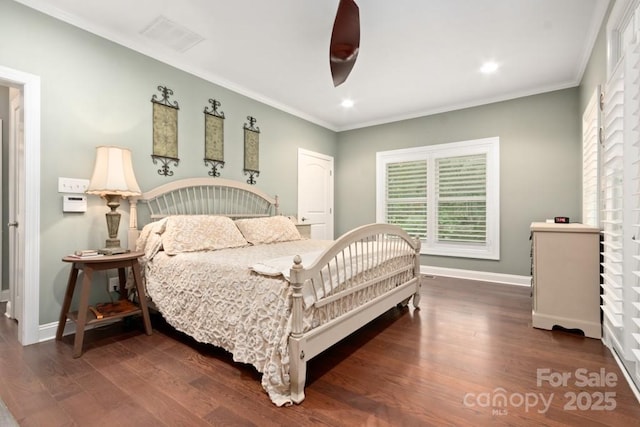 bedroom featuring wood finished floors, baseboards, ornamental molding, visible vents, and recessed lighting
