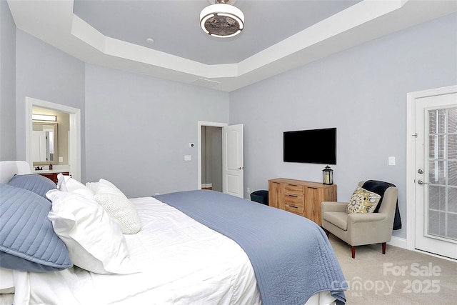 1105 Hoyle Ln, Waxhaw, NC 28173 - bedroom featuring a tray ceiling and light colored carpet