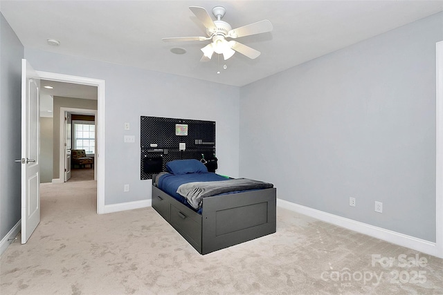 1105 Hoyle Ln, Waxhaw, NC 28173 - bedroom featuring light carpet, baseboards, and ceiling fan