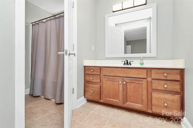 1105 Hoyle Ln, Waxhaw, NC 28173 - full bathroom with baseboards, vanity, and tile patterned floors