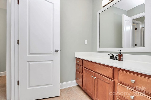 1105 Hoyle Ln, Waxhaw, NC 28173 - bathroom with baseboards, vanity, and tile patterned floors