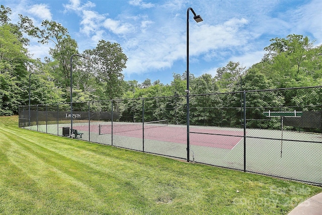 1105 Hoyle Ln, Waxhaw, NC 28173 - view of tennis court featuring fence and a yard