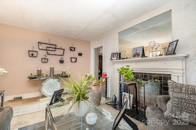 3919 Sarah Dr Unit 14, Charlotte, NC 28217 - carpeted dining space featuring visible vents and a fireplace