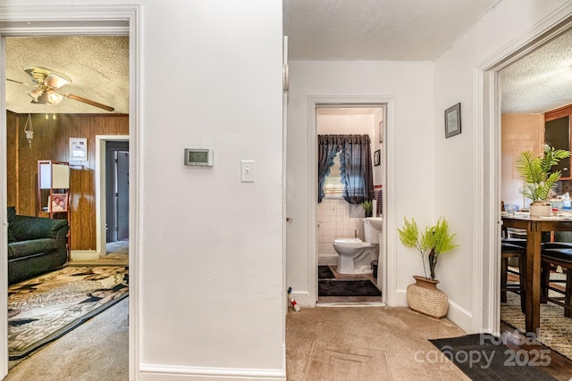3919 Sarah Dr Unit 14, Charlotte, NC 28217 - hall with a textured ceiling and carpet