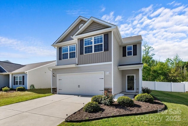 view of front facade featuring concrete driveway, fence, an attached garage, board and batten siding, and a front yard