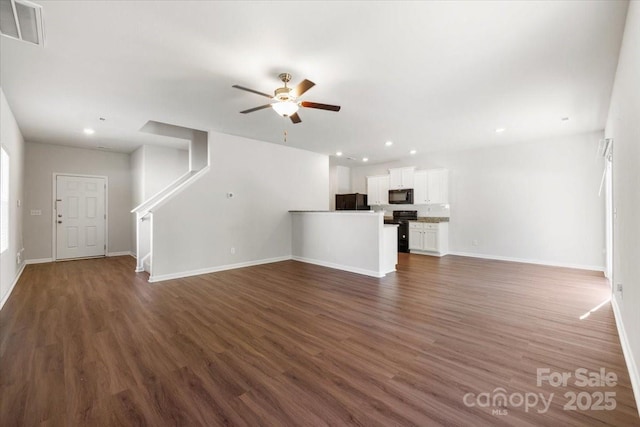 unfurnished living room with ceiling fan, baseboards, visible vents, and recessed lighting