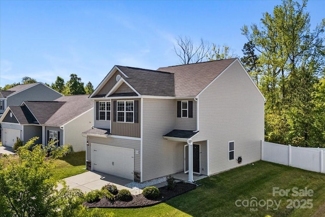 view of front of home featuring driveway, an attached garage, fence, a front yard, and roof with shingles