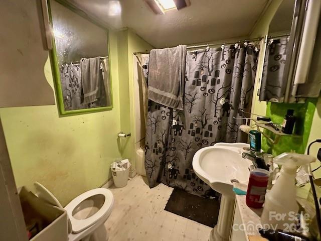 6000 S Main St, Salisbury, NC 28147 - full bathroom featuring shower / bathtub combination with curtain and wood finished floors