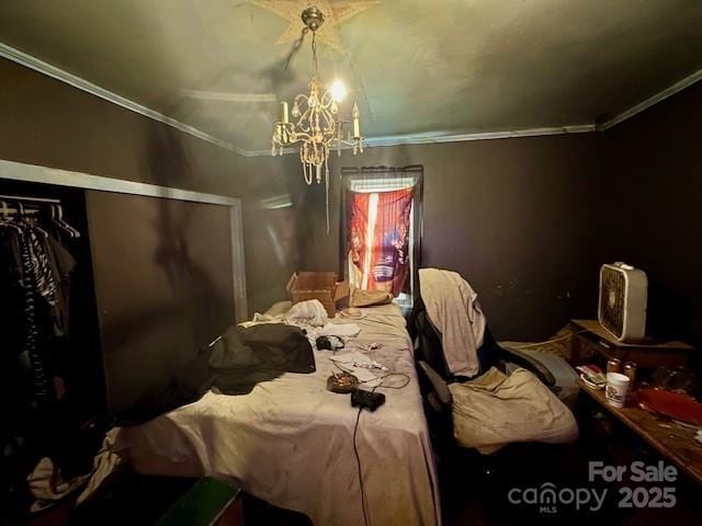 6000 S Main St, Salisbury, NC 28147 - bedroom with crown molding, a chandelier, and a closet