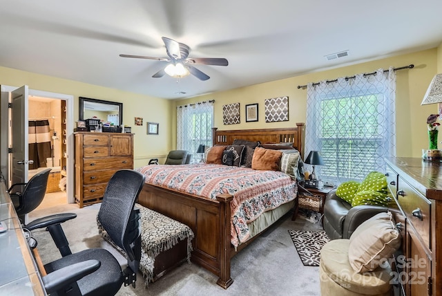 10836 Maryanna Ct, Charlotte, NC 28213 - bedroom featuring visible vents, a ceiling fan, and light carpet