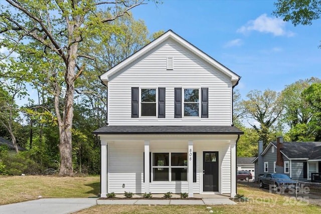 808 Carolyn Ave, Kannapolis, NC 28083 - view of front facade with a front lawn and covered porch