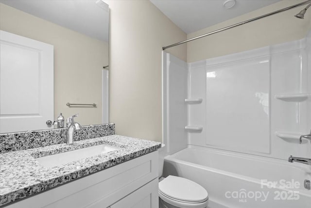 808 Carolyn Ave, Kannapolis, NC 28083 - bathroom featuring toilet, vanity, and shower / washtub combination