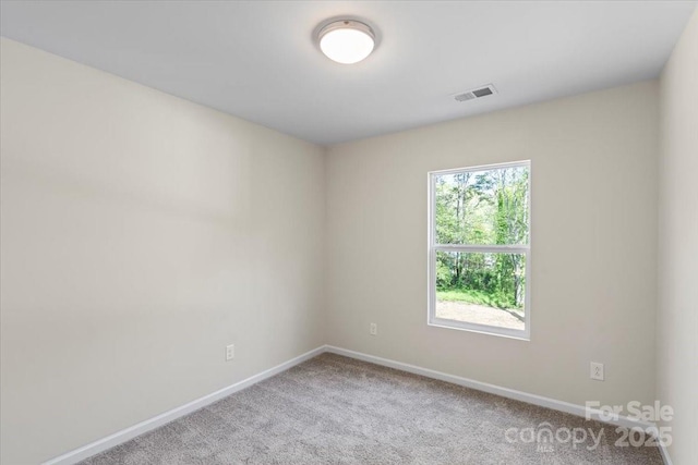 808 Carolyn Ave, Kannapolis, NC 28083 - carpeted spare room featuring baseboards and visible vents