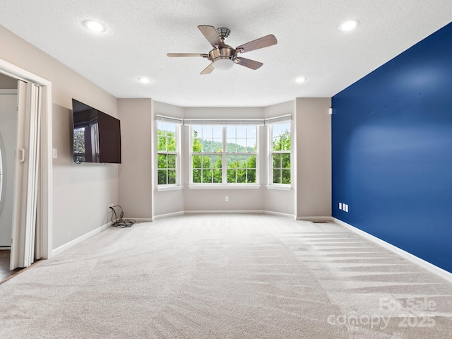 106 Thistle Tree Way, Weaverville, NC 28787 - carpeted spare room with a ceiling fan, baseboards, recessed lighting, and a textured ceiling