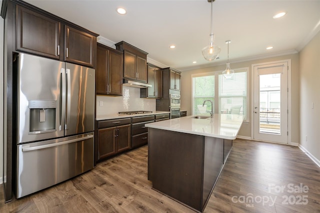 604 Tudor Park Way, Charlotte, NC 28211 - kitchen with stainless steel appliances, dark brown cabinetry, and ornamental molding