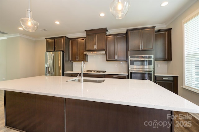 604 Tudor Park Way, Charlotte, NC 28211 - kitchen with a wealth of natural light, a sink, appliances with stainless steel finishes, and crown molding