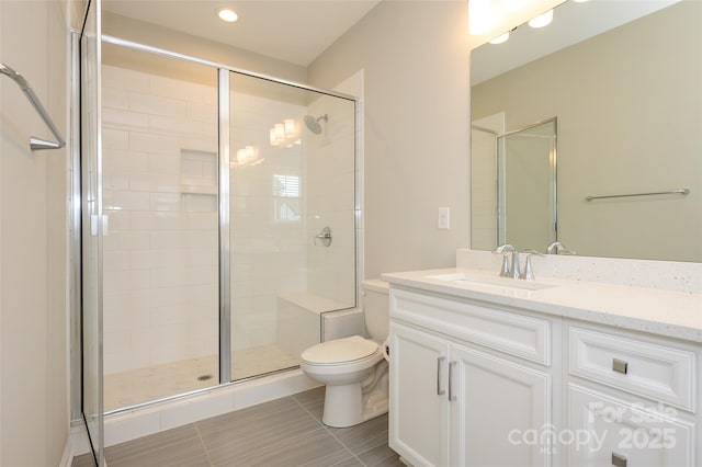604 Tudor Park Way, Charlotte, NC 28211 - full bathroom featuring toilet, recessed lighting, tile patterned flooring, a shower stall, and vanity
