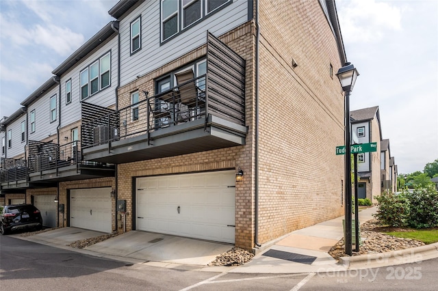 604 Tudor Park Way, Charlotte, NC 28211 - view of building exterior with a garage