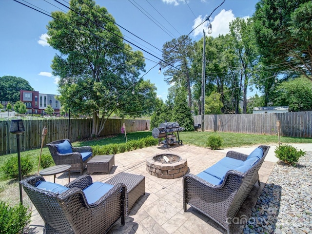 view of patio with a fire pit and area for grilling