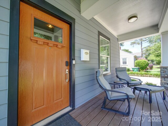 wooden deck with a porch