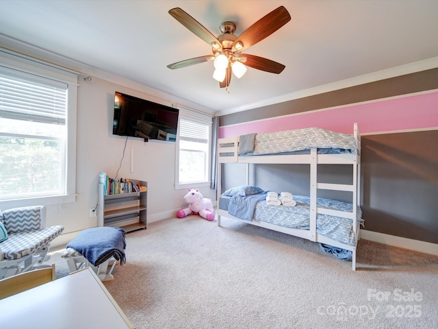 bedroom featuring carpet, a ceiling fan, and baseboards