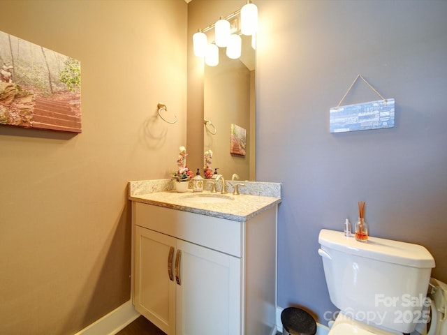 half bath with toilet and vanity