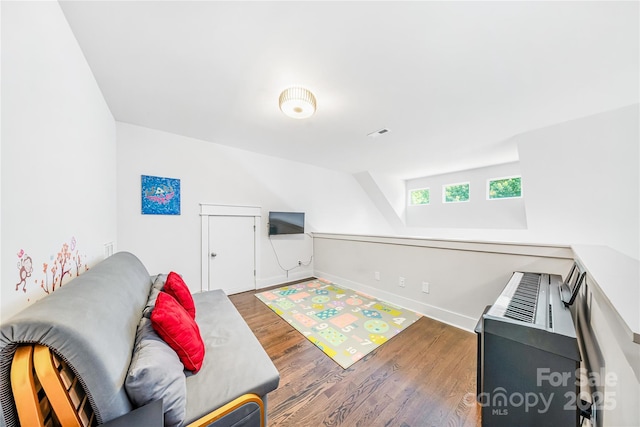1421 Lyon Ct, Charlotte, NC 28205 - recreation room with wood finished floors and baseboards