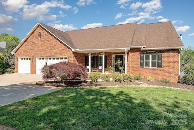 view of front of property with a porch, brick siding, a front yard, concrete driveway, and a garage