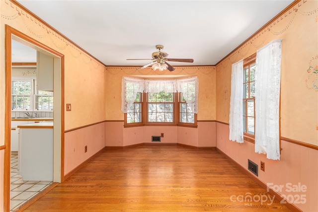 220 Ridge Rd, Waynesville, NC 28786 - unfurnished room featuring light wood-type flooring and ceiling fan