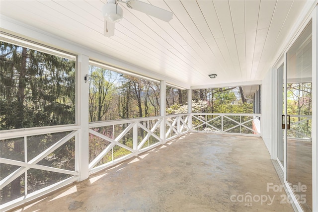 220 Ridge Rd, Waynesville, NC 28786 - unfurnished sunroom featuring a ceiling fan