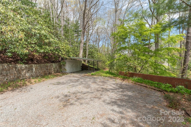 220 Ridge Rd, Waynesville, NC 28786 - view of patio / terrace featuring a carport and driveway