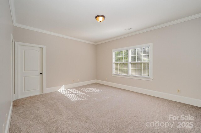 108 Bare Foot Ln, Mooresville, NC 28117 - unfurnished room with carpet floors, ornamental molding, visible vents, and baseboards