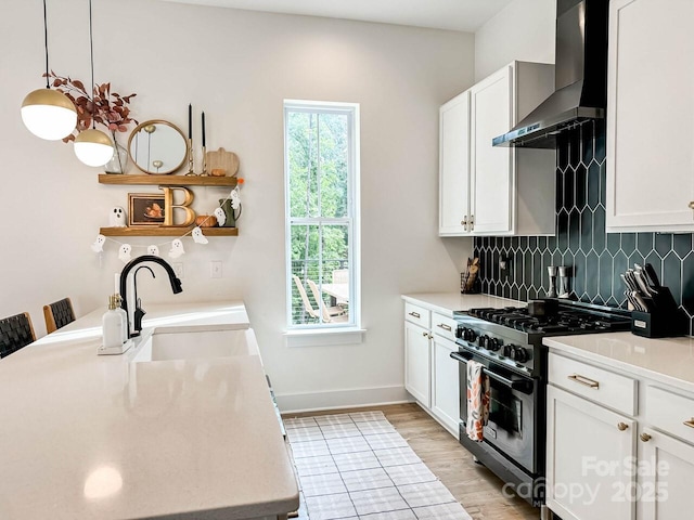 1123 Fern Hill Rd, Mooresville, NC 28117 - kitchen with high end stainless steel range oven, open shelves, wall chimney range hood, tasteful backsplash, and white cabinets