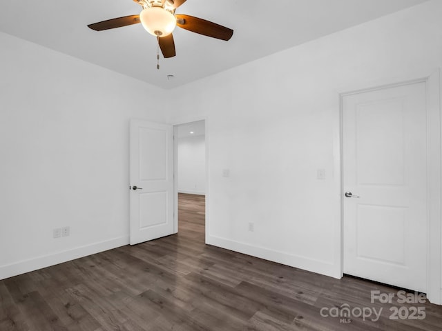 1938 Upper Ridgewood Blvd, Hendersonville, NC 28791 - unfurnished bedroom featuring wood finished floors, baseboards, and ceiling fan