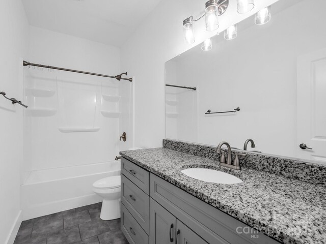 1938 Upper Ridgewood Blvd, Hendersonville, NC 28791 - full bathroom featuring toilet, bathtub / shower combination, vanity, and tile patterned floors