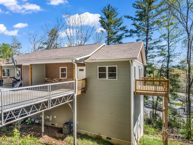 1938 Upper Ridgewood Blvd, Hendersonville, NC 28791 - back of house featuring a wooden deck, roof with shingles, central AC, and crawl space