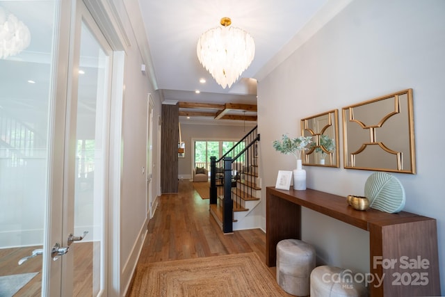 724 Ideal Way, Charlotte, NC 28203 - corridor with wood finished floors, beam ceiling, stairs, a chandelier, and recessed lighting
