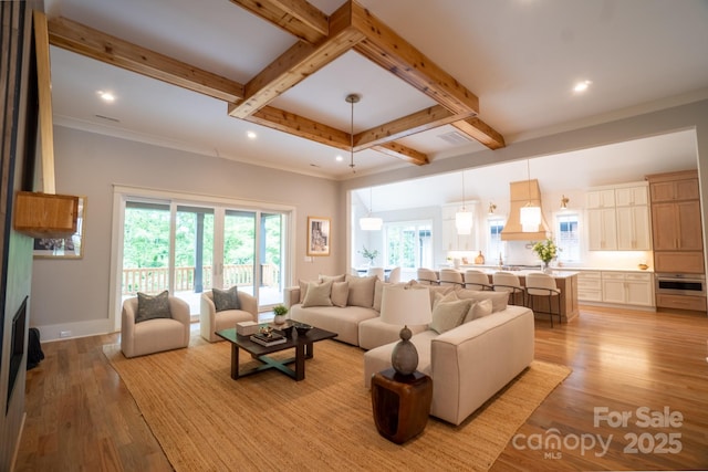 724 Ideal Way, Charlotte, NC 28203 - living area featuring beam ceiling, light wood finished floors, coffered ceiling, and recessed lighting