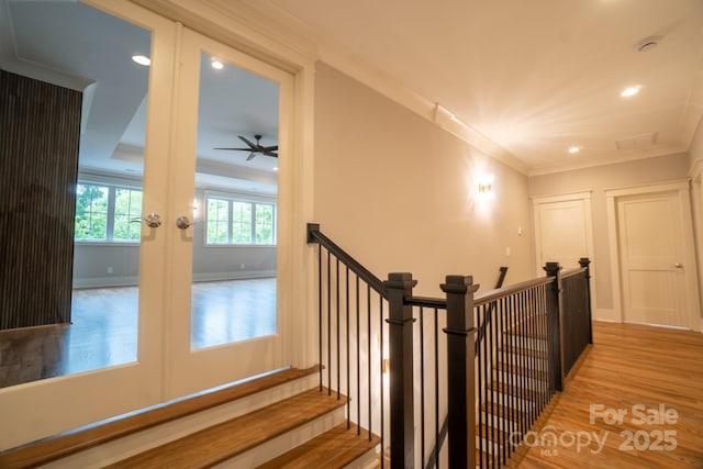 724 Ideal Way, Charlotte, NC 28203 - stairway featuring wood finished floors, a ceiling fan, french doors, ornamental molding, and recessed lighting
