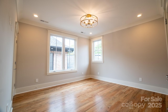 724 Ideal Way, Charlotte, NC 28203 - spare room featuring a chandelier, light wood-style floors, and recessed lighting