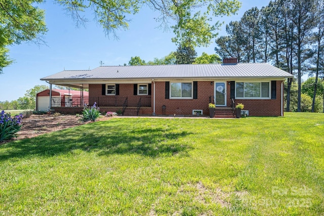 3340 Wrenwood Dr, Newton, NC 28658 - view of front of home with a chimney, a front yard, entry steps, a garage, and brick siding
