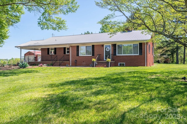 3340 Wrenwood Dr, Newton, NC 28658 - ranch-style home featuring brick siding, a chimney, a front lawn, and metal roof