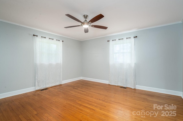 3340 Wrenwood Dr, Newton, NC 28658 - spare room with ceiling fan, light wood finished floors, baseboards, and ornamental molding