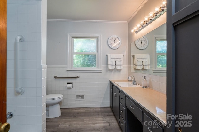 3340 Wrenwood Dr, Newton, NC 28658 - bathroom with toilet, tile walls, wood finished floors, crown molding, and vanity