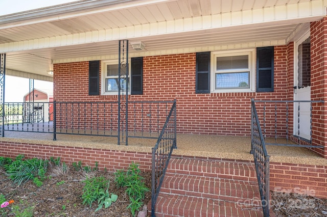 3340 Wrenwood Dr, Newton, NC 28658 - view of property exterior featuring brick siding and covered porch
