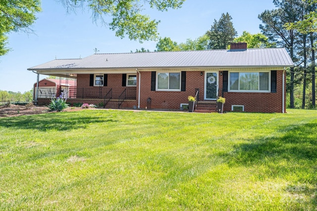 3340 Wrenwood Dr, Newton, NC 28658 - single story home with brick siding, entry steps, a chimney, and a front lawn