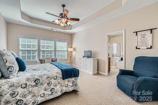 1151 Donelea Ln NW, Concord, NC 28027 - carpeted bedroom featuring visible vents, baseboards, connected bathroom, and ceiling fan