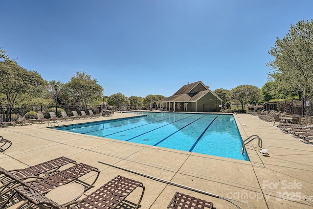 1151 Donelea Ln NW, Concord, NC 28027 - pool featuring fence and a patio