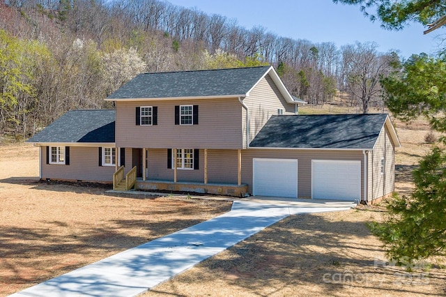 3424 Walker Cir, Lenoir, NC 28645 - view of front of home featuring concrete driveway, a shingled roof, a porch, and a garage